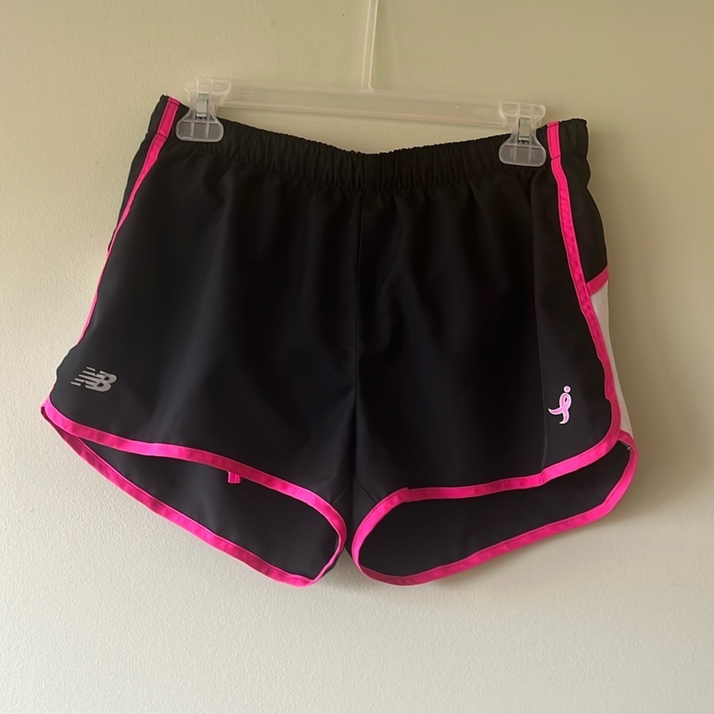 Women’s new balance black and hot pink running shorts with liner. Size Medium